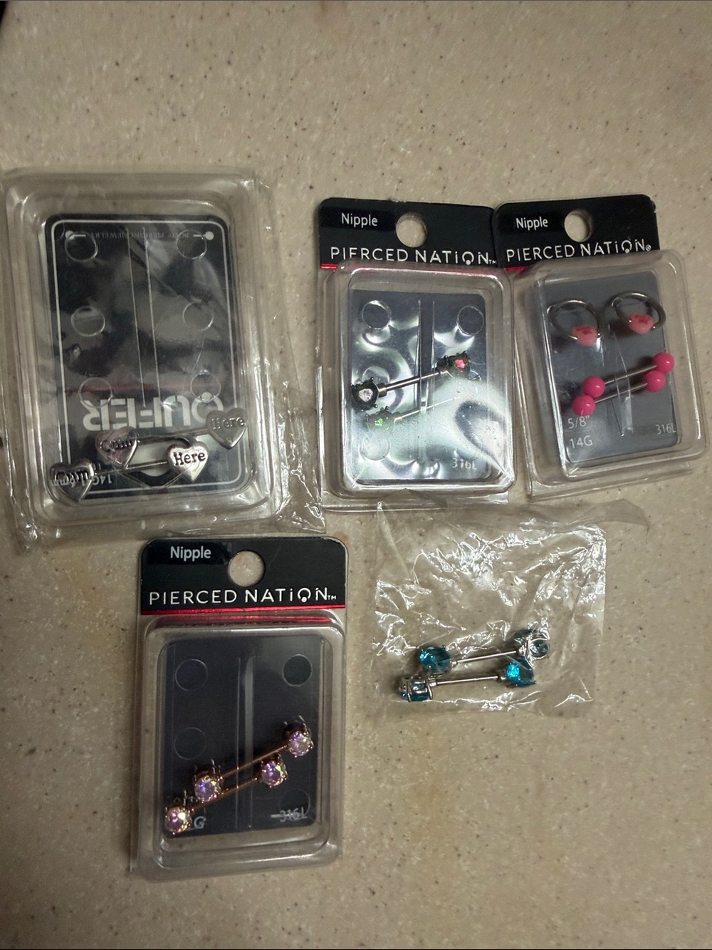 Pierced Nation Pink and Teal Nipple Barbell Set